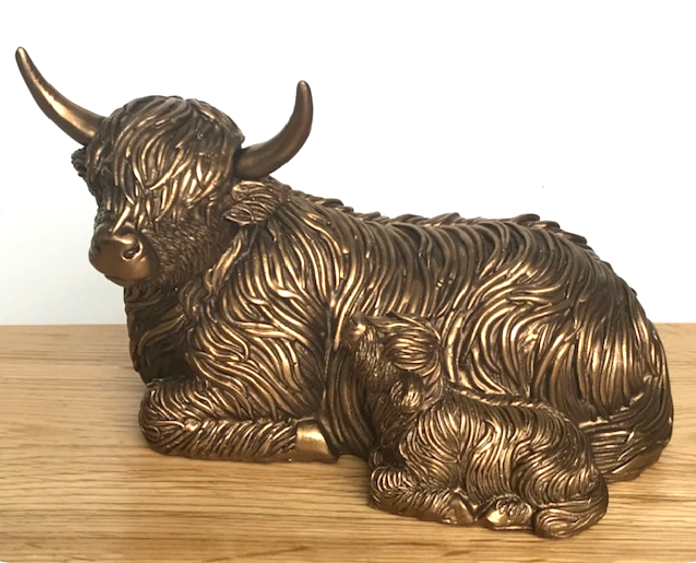 Laying Highland Cow Mother & Calf ornament figurine from the Leonardo Reflections Bronzed range