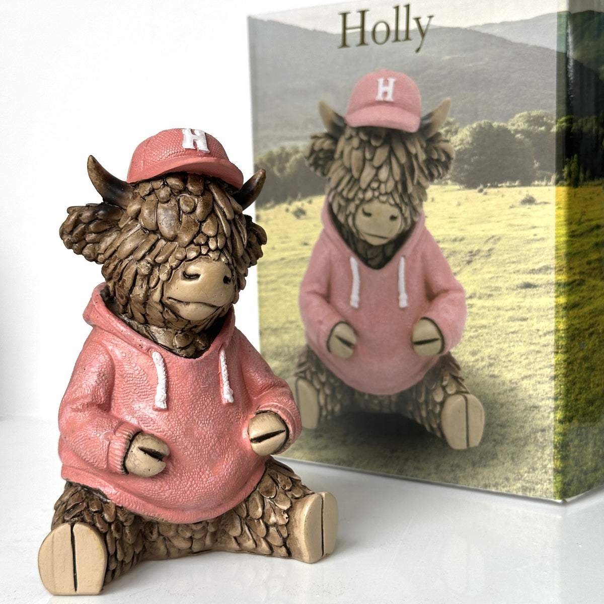 Holly in a Hoodie, from the Hughie Highland Cow range by Lesser & Pavey