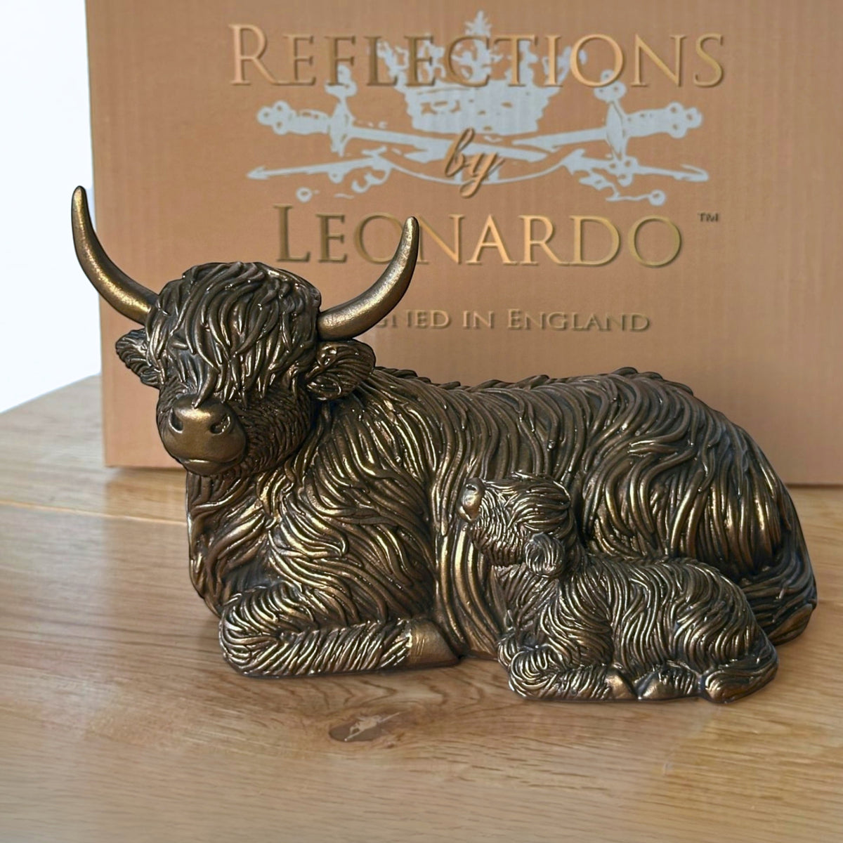 Laying Highland Cow Mother & Calf ornament figurine from the Leonardo Reflections Bronzed range