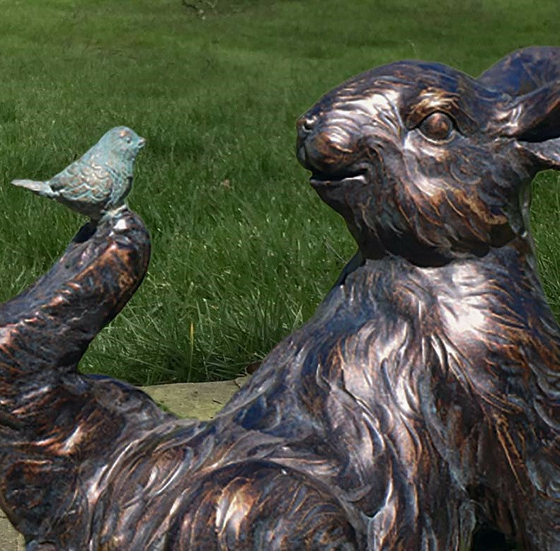 Playful Rabbit with a Bird on Foot figurine, novelty home or garden decoration (21cm)