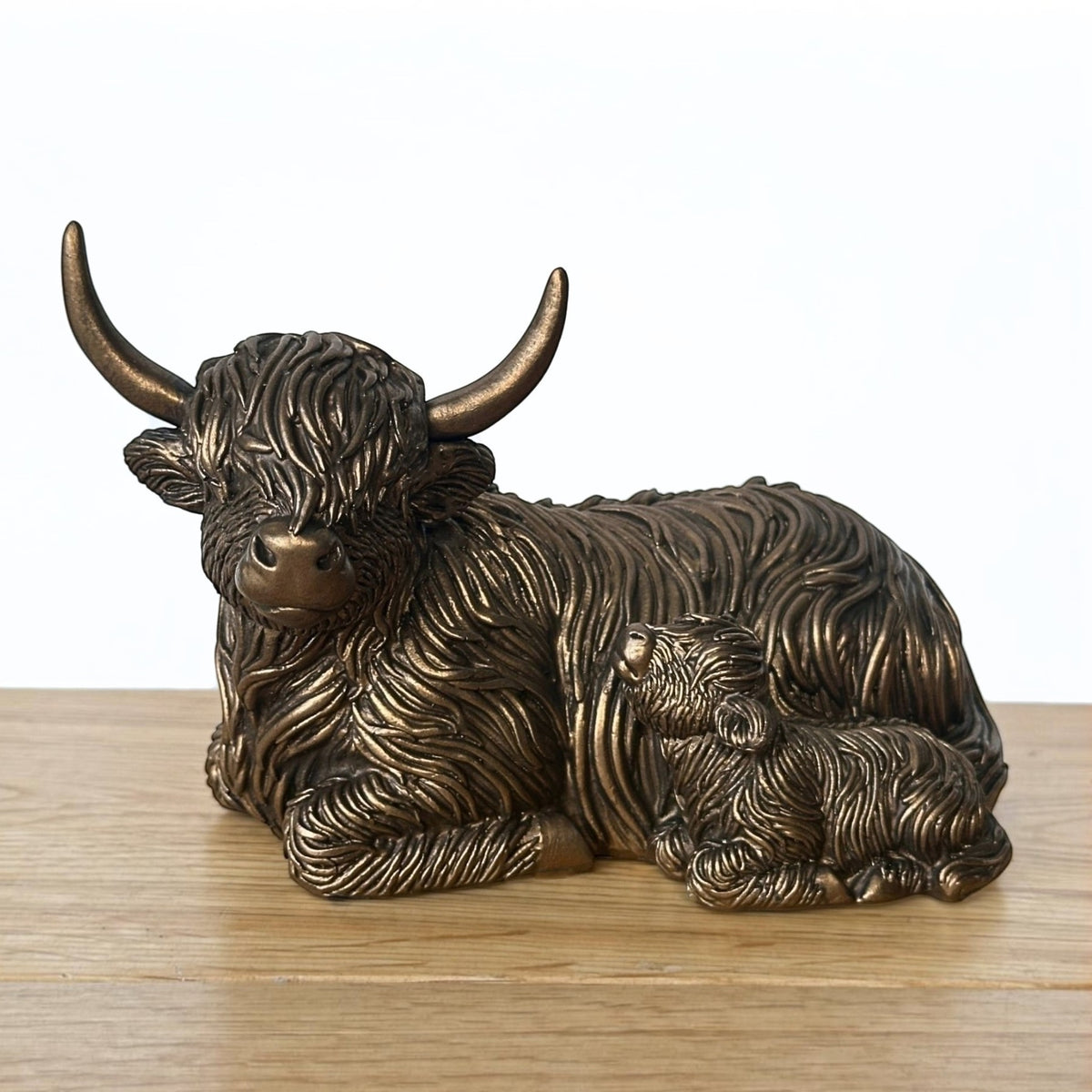 Laying Highland Cow Mother & Calf ornament figurine from the Leonardo Reflections Bronzed range
