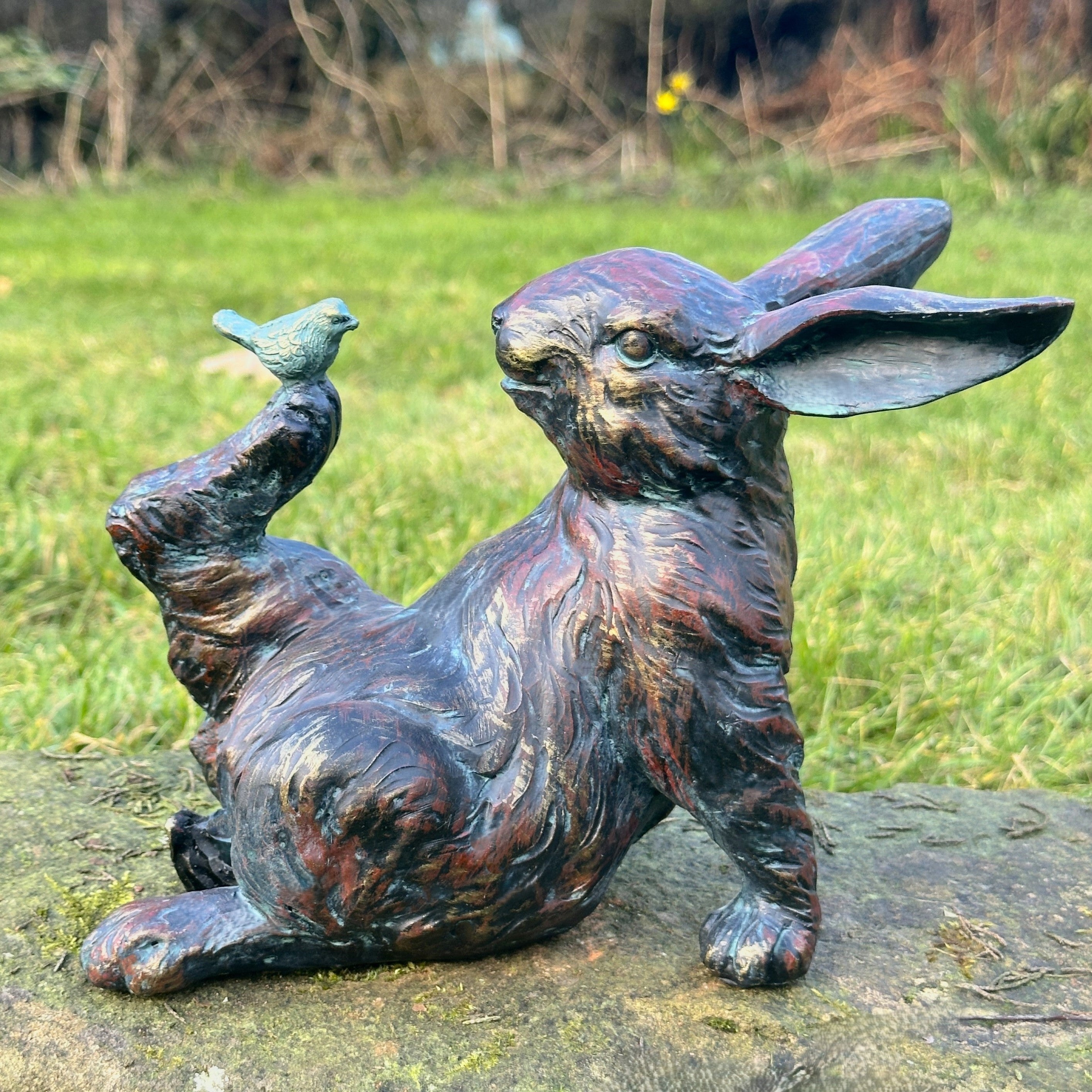 Playful Rabbit with a Bird on Foot figurine, novelty home or garden decoration (21cm)