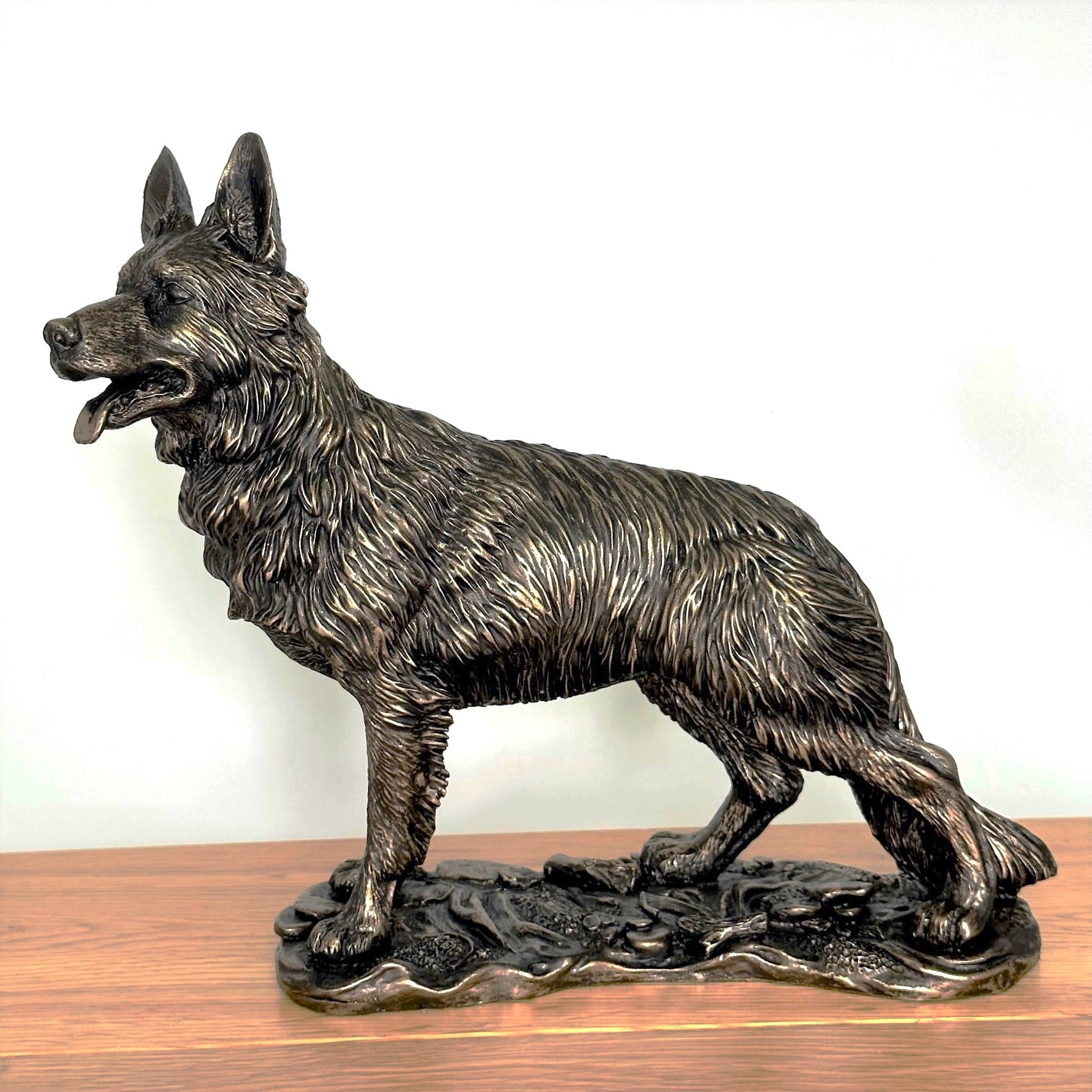 Heavy weight dark bronze effect German Shepherd Dog figurine, 26cm long